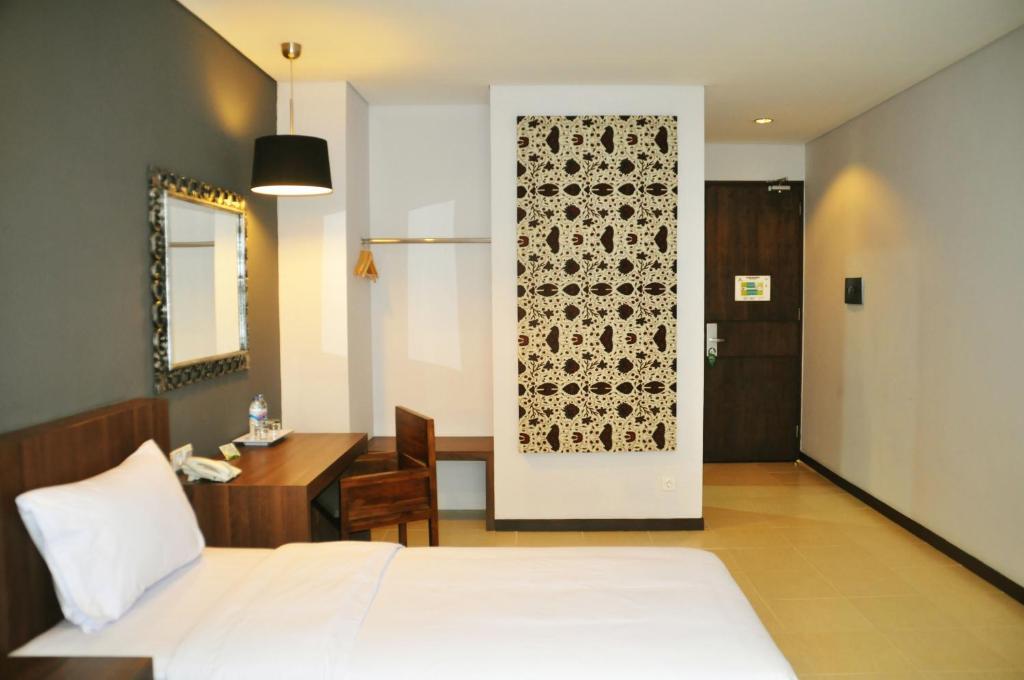 Praja Hotel Denpasar Quarto foto